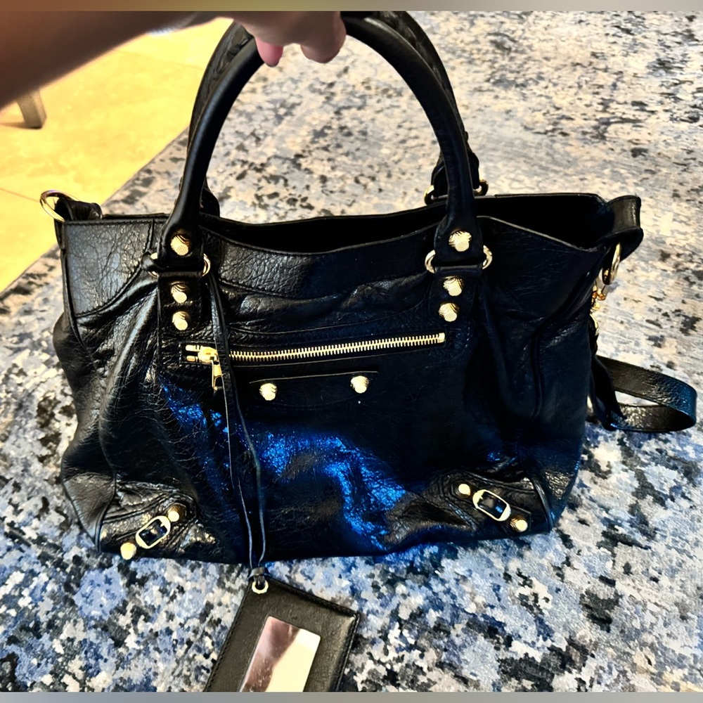 Pre-Loved Balenciaga City Bag black leather with gold accents for sale!